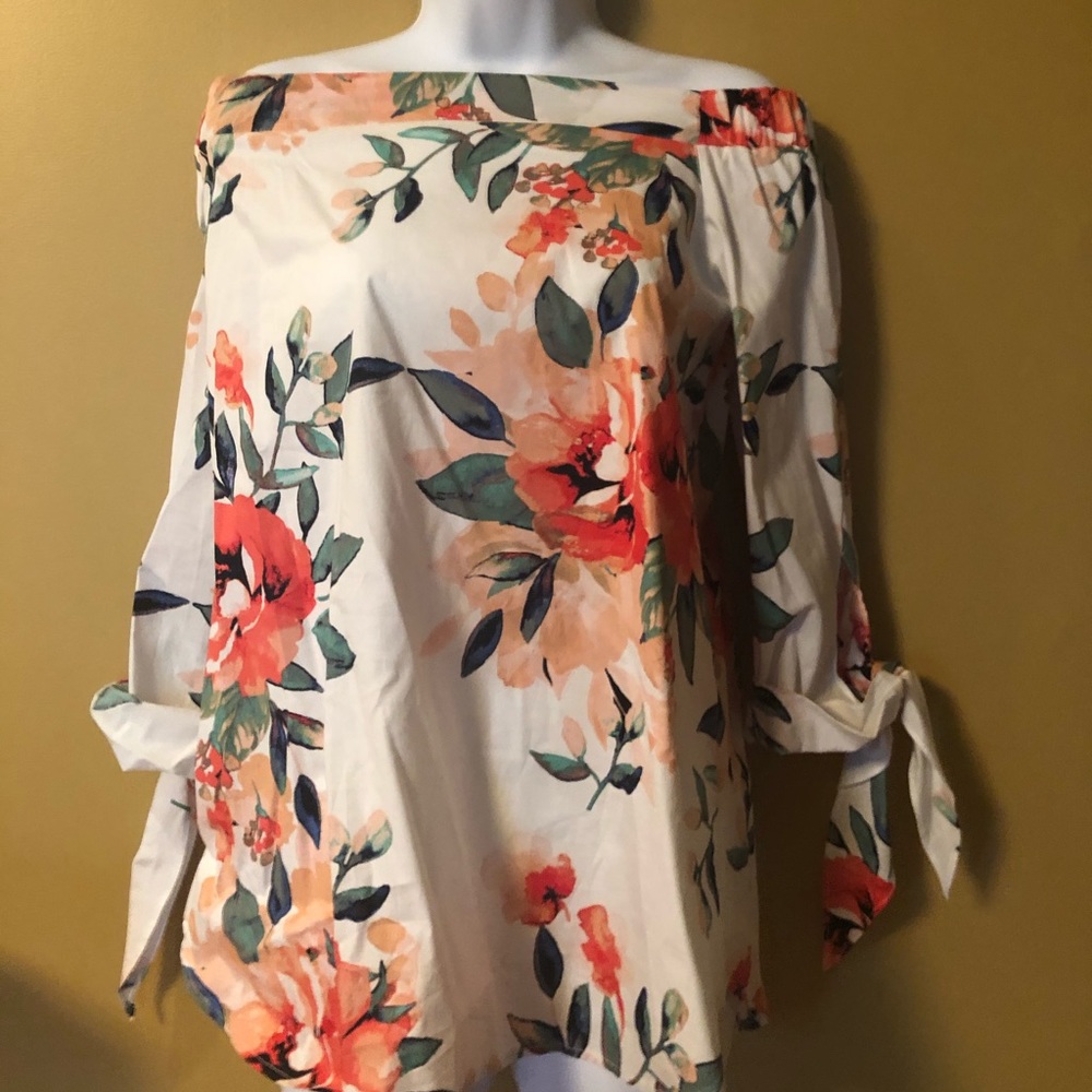 Boutique off the shoulder floral shirt.